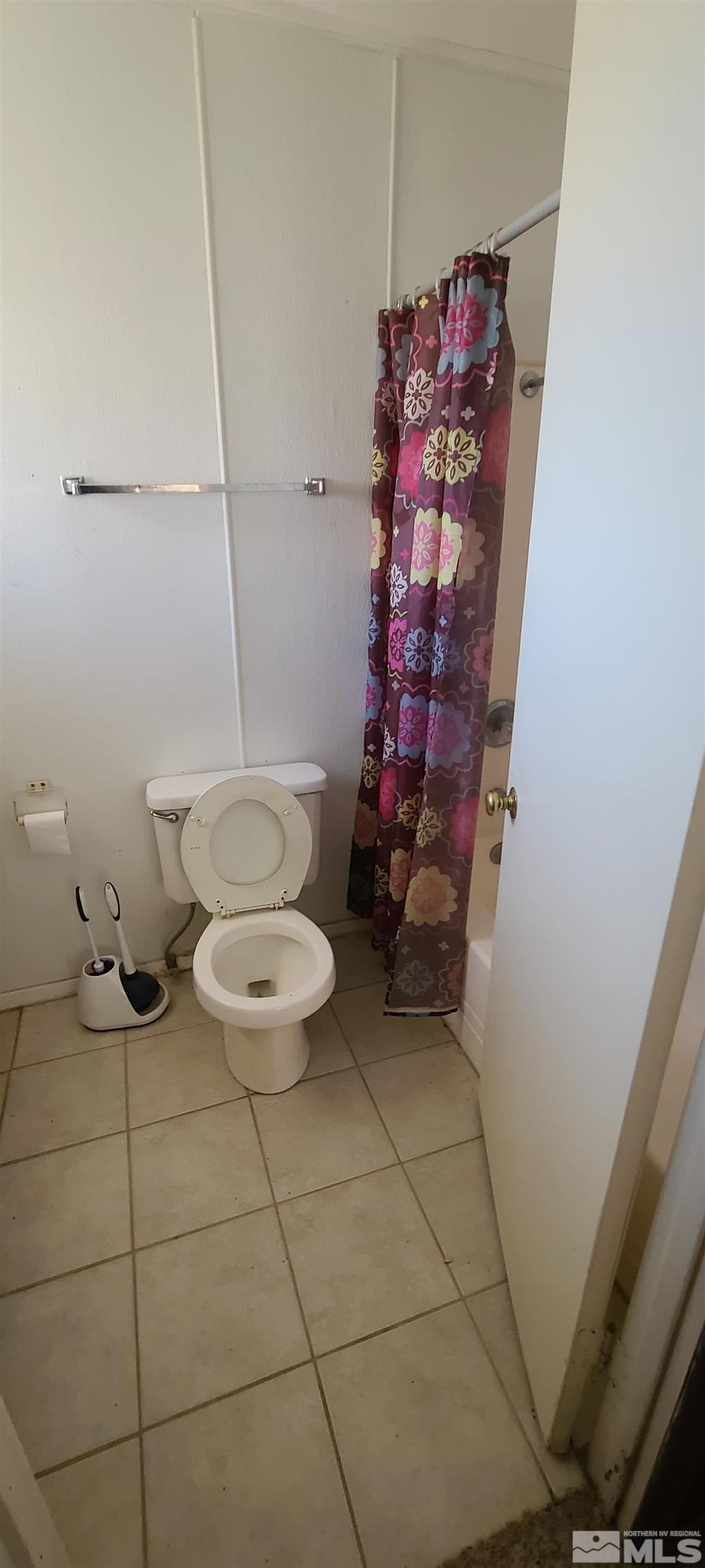 390 Kingston Canyon Road Austin, NV 89310 - Photo 13 of 17 a bathroom with a toilet and a shower