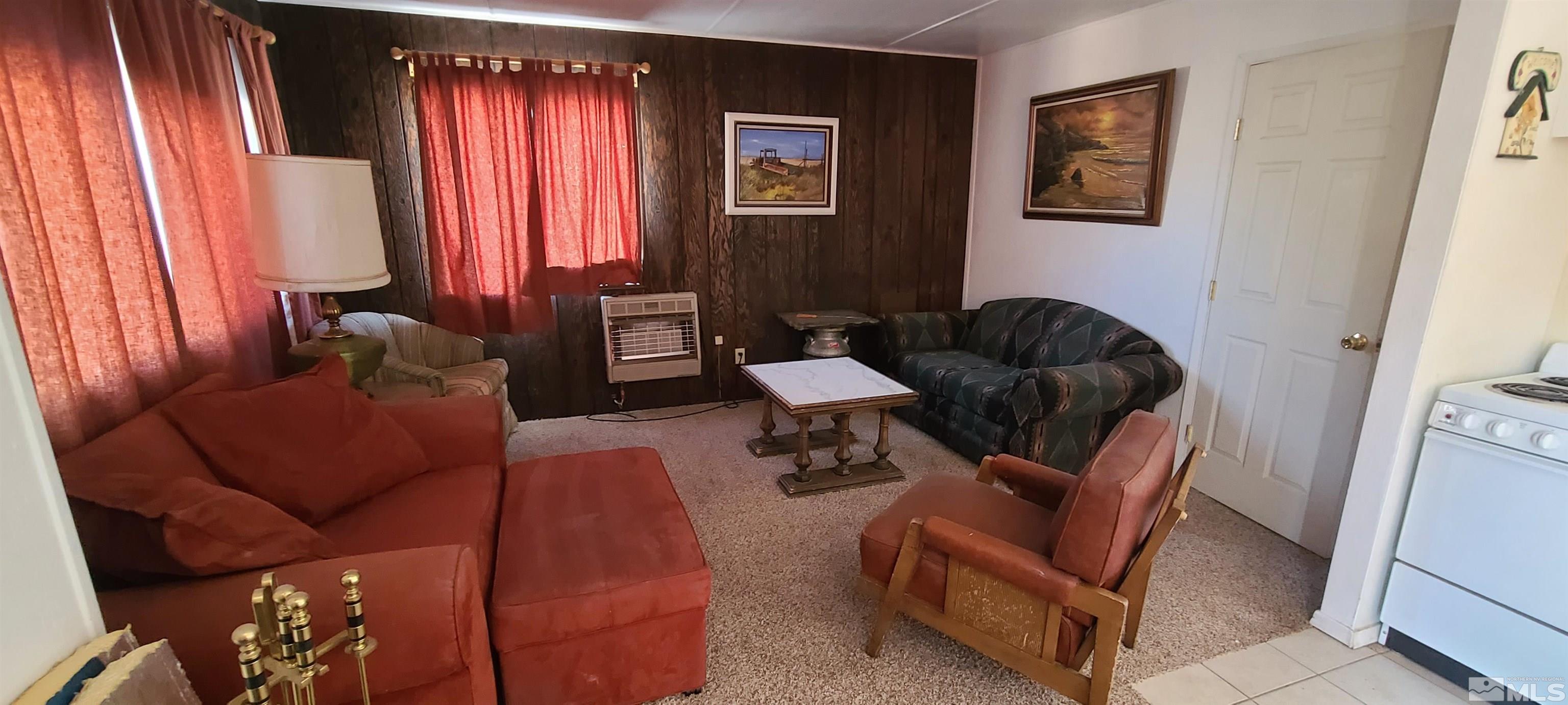 390 Kingston Canyon Road Austin, NV 89310 - Photo 3 of 17 a living room with furniture and a window