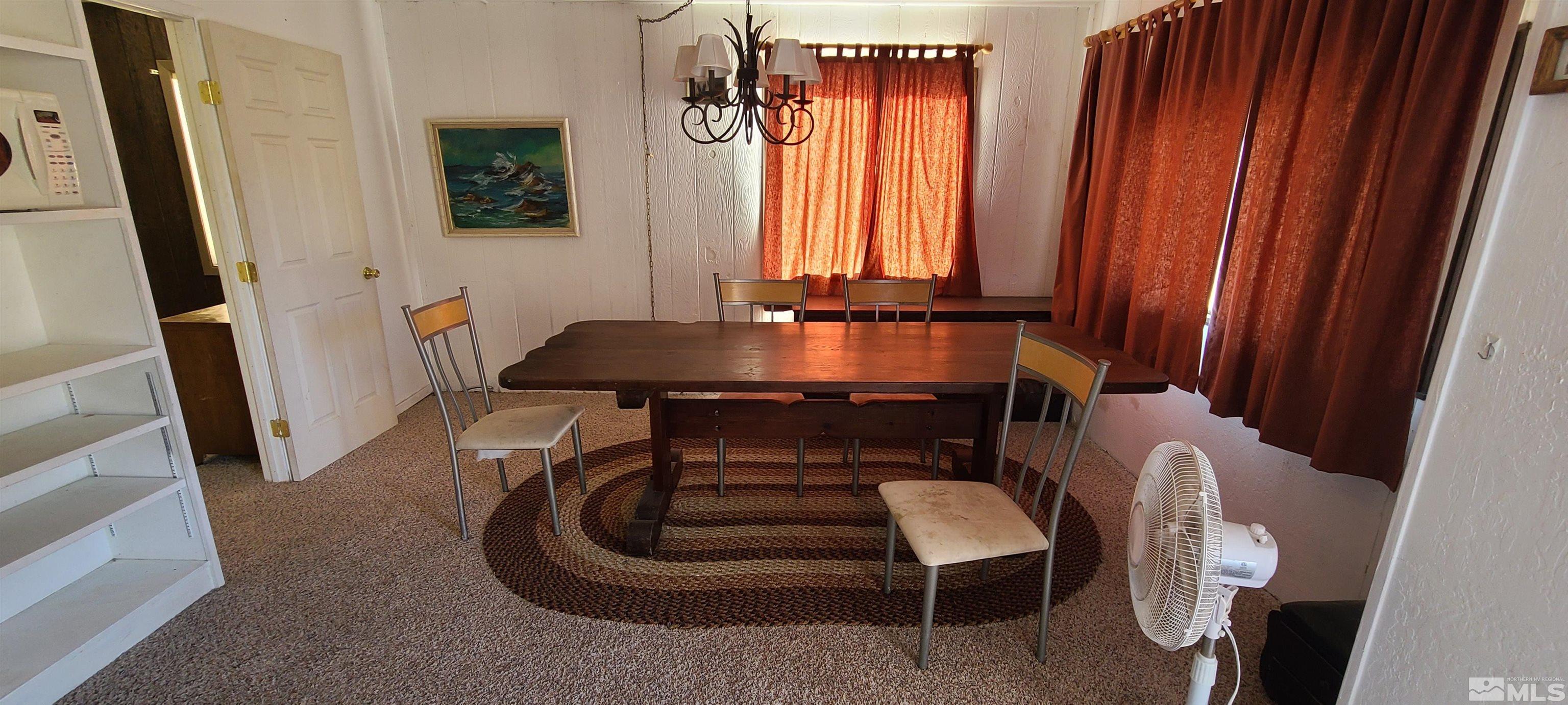 390 Kingston Canyon Road Austin, NV 89310 - Photo 6 of 17 a room with furniture and a window