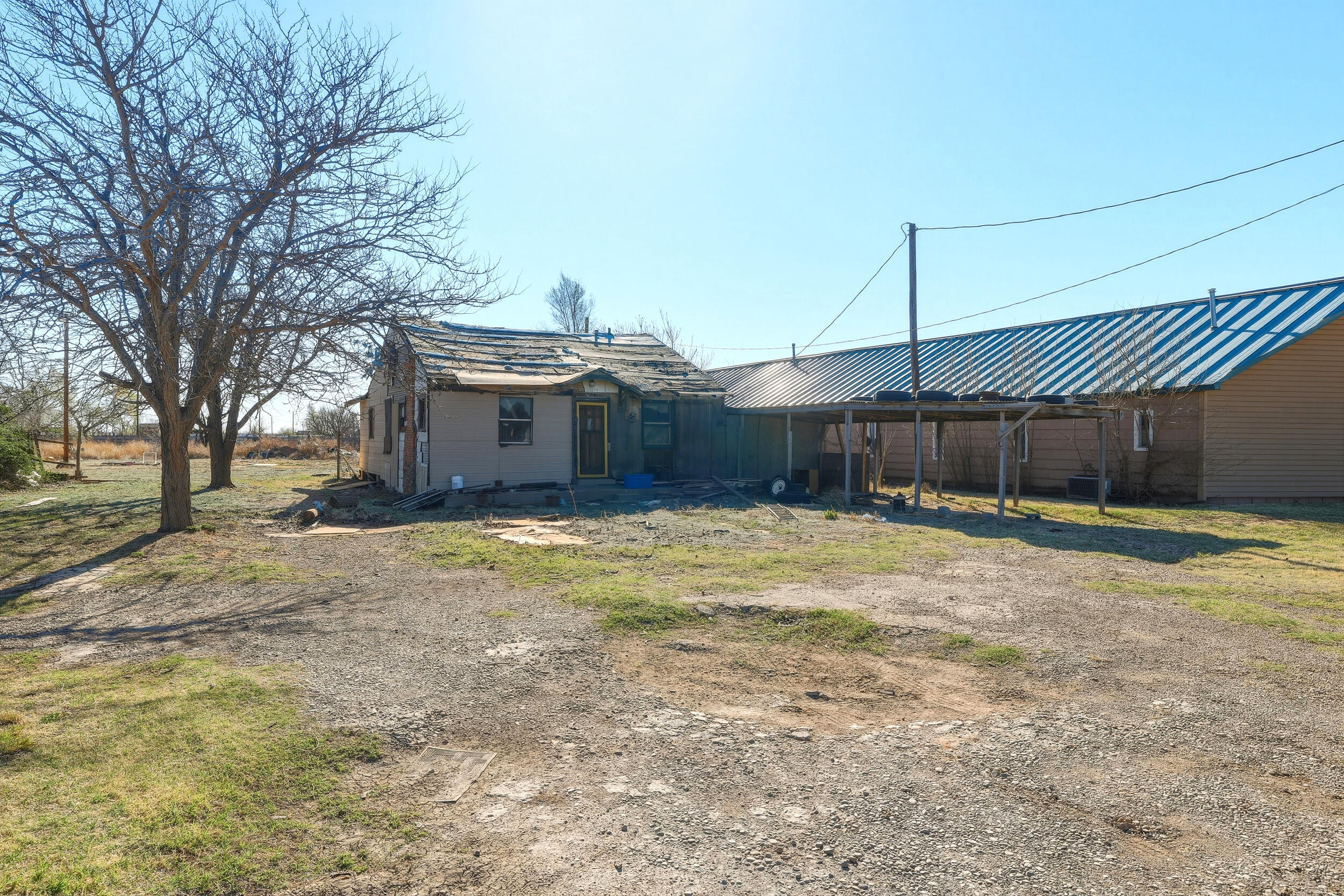 607 Inler Avenue Lubbock, TX 79416 - Photo 4 of 13 a house view with a backyard space