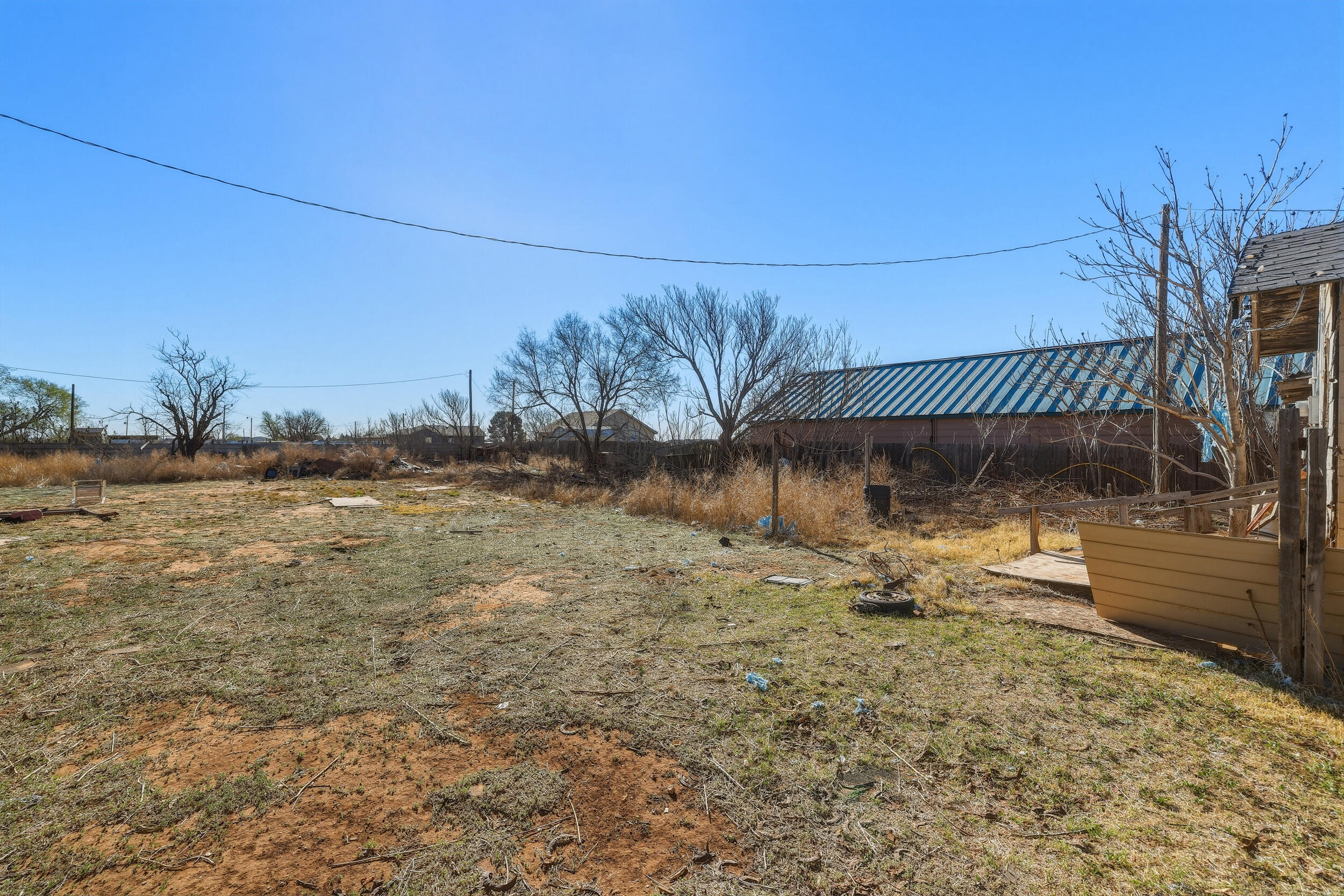 607 Inler Avenue Lubbock, TX 79416 - Photo 5 of 13 a backyard of a house
