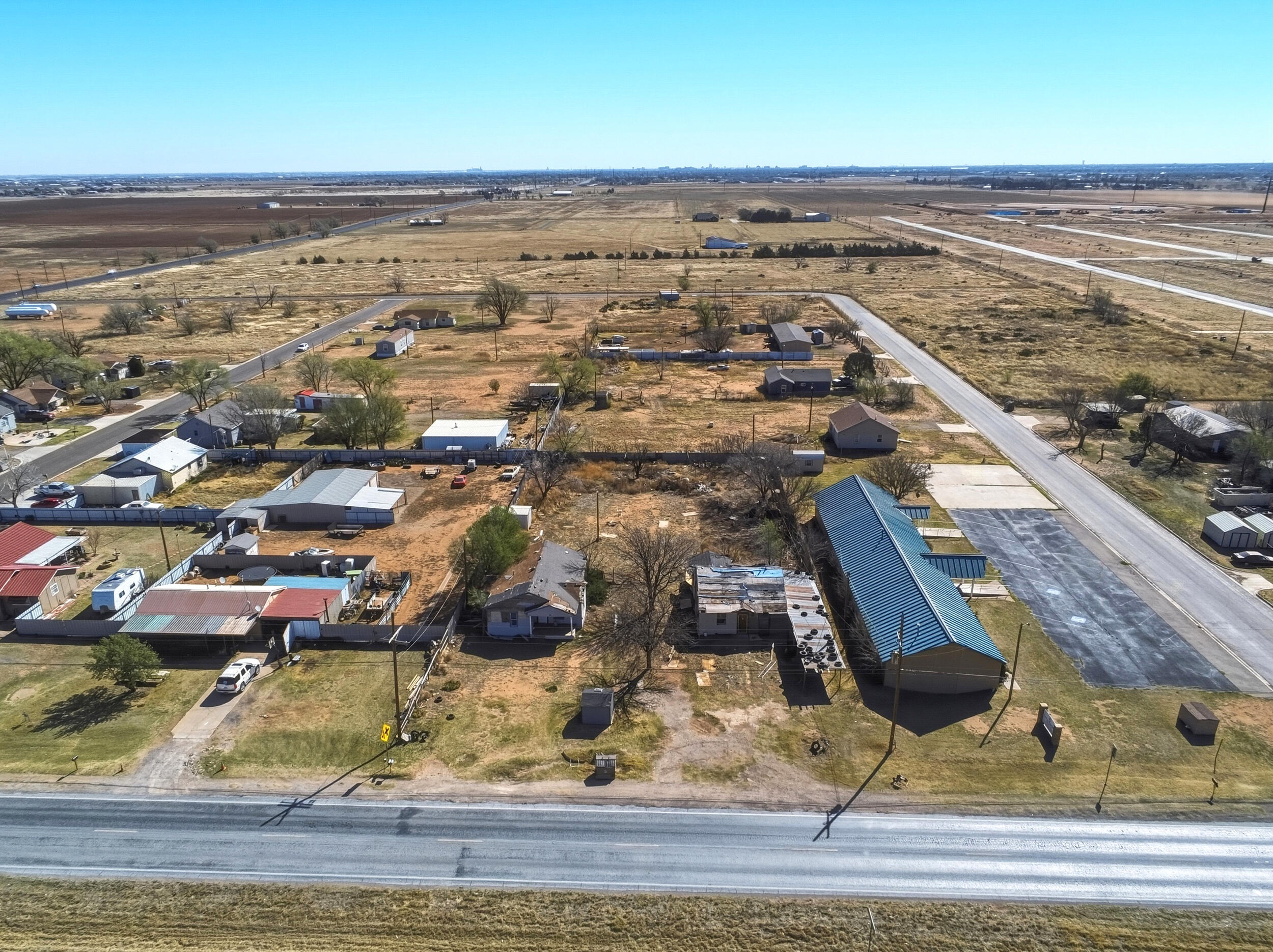 607 Inler Avenue Lubbock, TX 79416 - Photo 6 of 13 an aerial view of residential houses with outdoor space