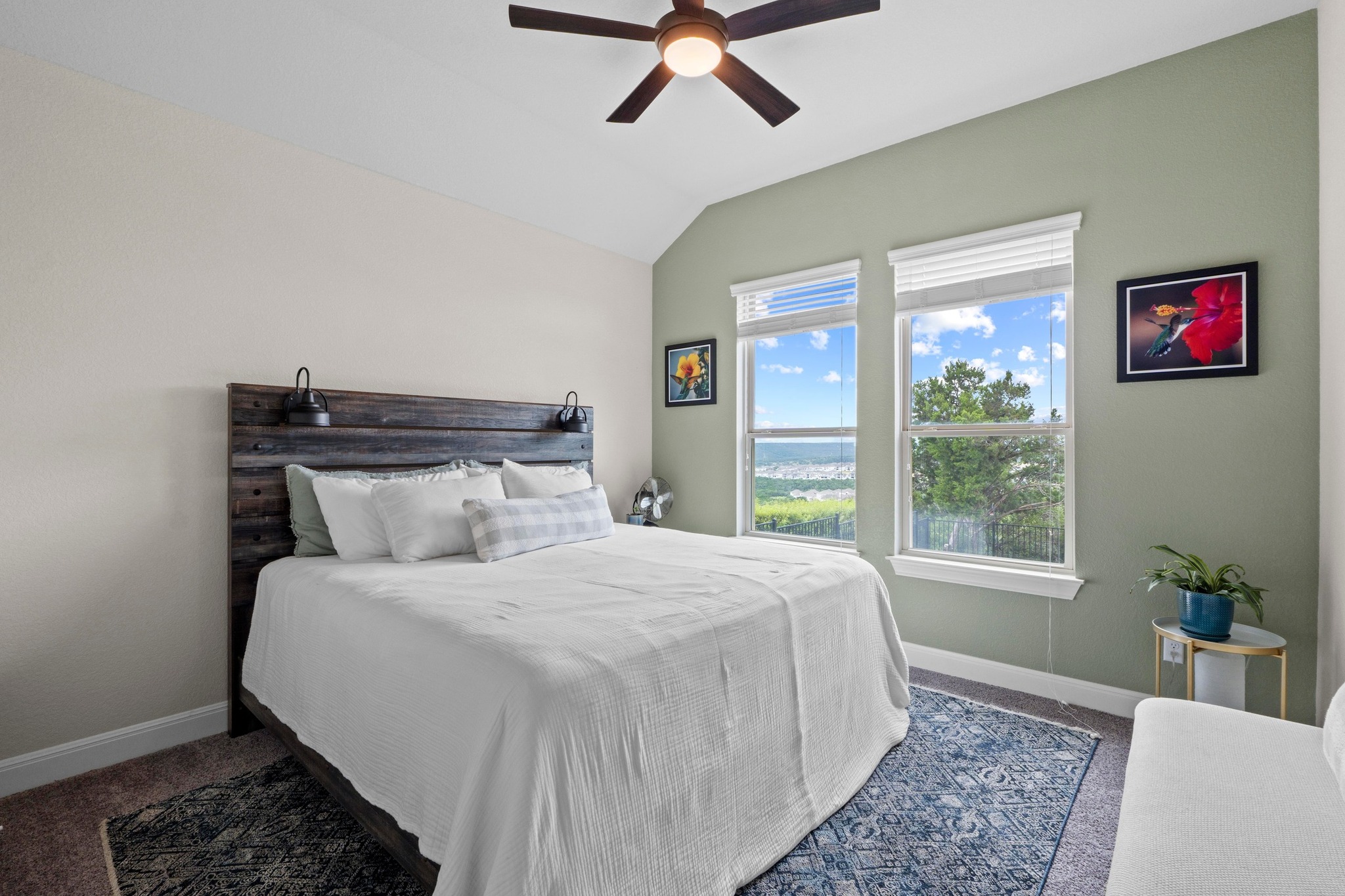 1329 Siena Sunset Road Leander, TX 78641 - Photo 23 of 33 Bedroom 4 on main level looks out over the pool, TREX deck and greenery beyond.