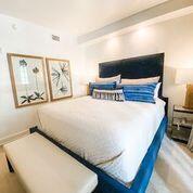 136 Georgetown Avenue, Unit 3F6 Inlet Beach, FL 32461 - Photo 4 of 4 a bed sitting in a bedroom with a large window