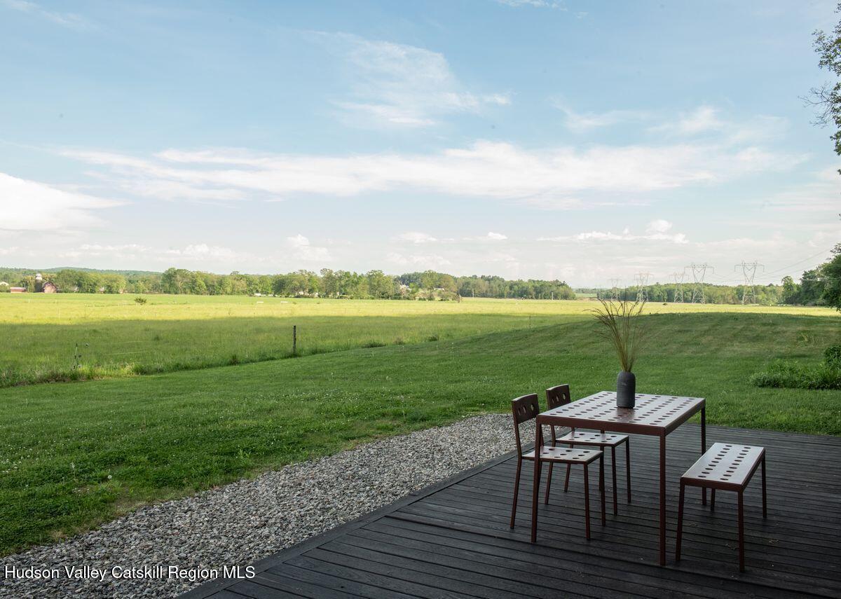346 Cold Spring Road Hudson, NY 12534 - Photo 20 of 25 a view of a patio with a table & chairs