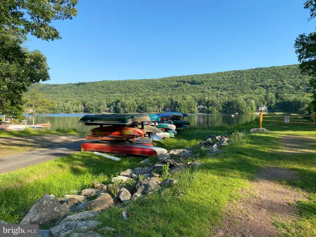 a view of a park with a lake view