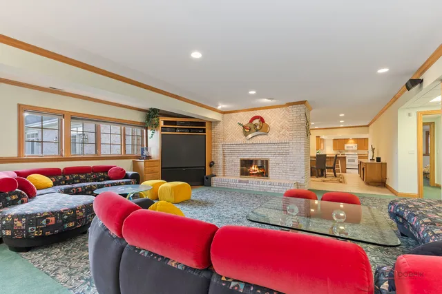 a kitchen with stainless steel appliances granite countertop sink and wooden cabinets