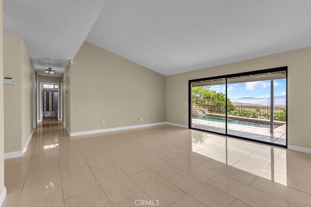 67525 Monterey Road Desert Hot Springs, CA 92240 - Photo 11 of 75 a view of an empty room with a window