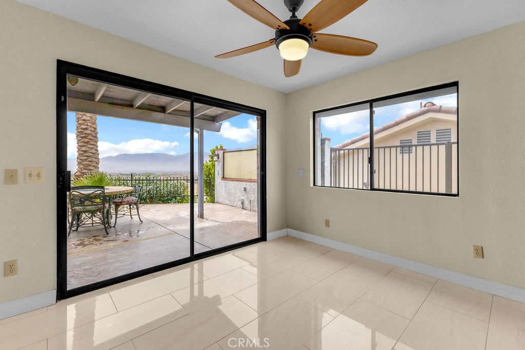 67525 Monterey Road Desert Hot Springs, CA 92240 - Photo 22 of 75 a view of an empty room with a balcony