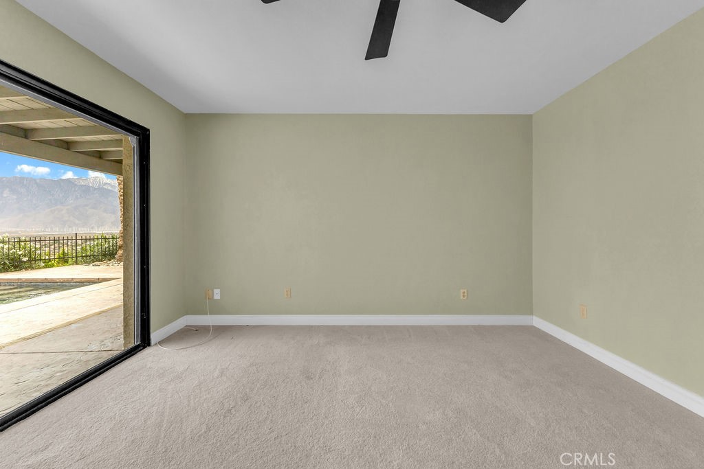 67525 Monterey Road Desert Hot Springs, CA 92240 - Photo 28 of 75 a view of an empty room with a window