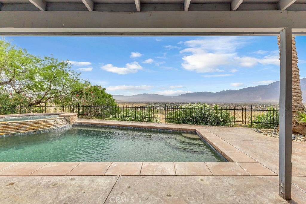 67525 Monterey Road Desert Hot Springs, CA 92240 - Photo 40 of 75 a view of swimming pool from a balcony