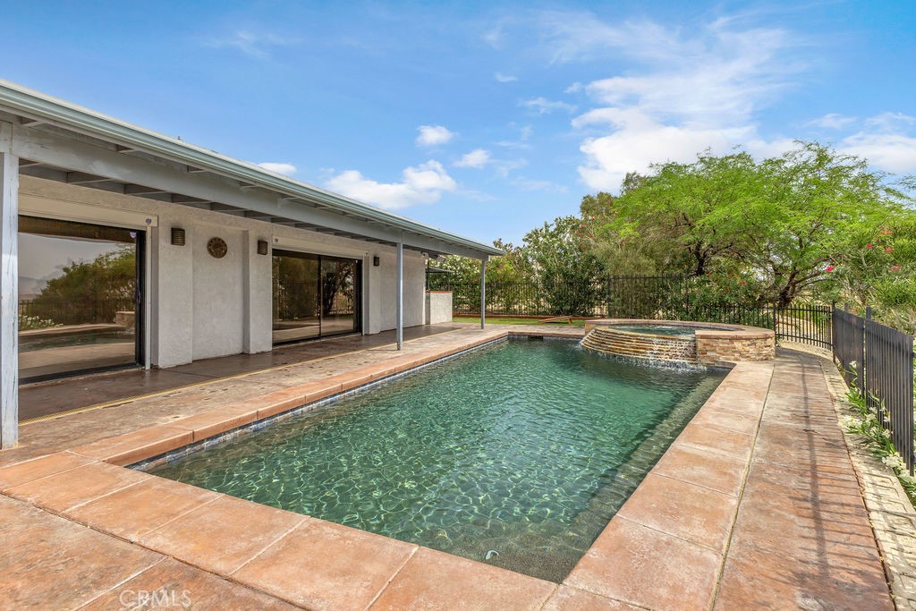 67525 Monterey Road Desert Hot Springs, CA 92240 - Photo 43 of 75 a view of swimming pool with a yard
