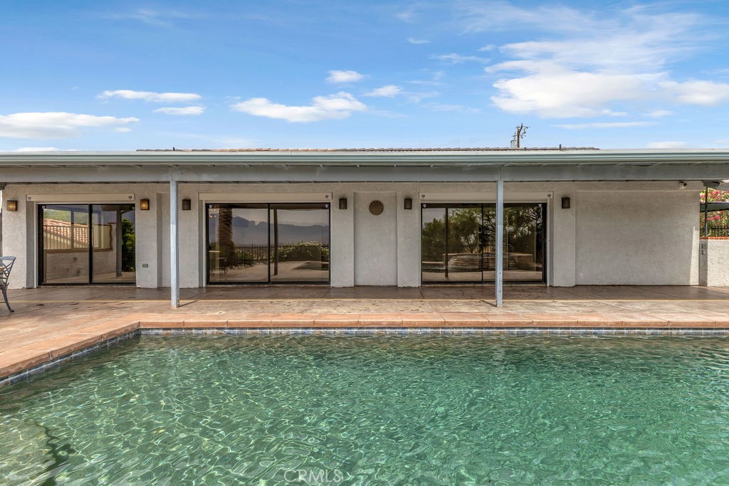 67525 Monterey Road Desert Hot Springs, CA 92240 - Photo 44 of 75 front view of a house with a yard