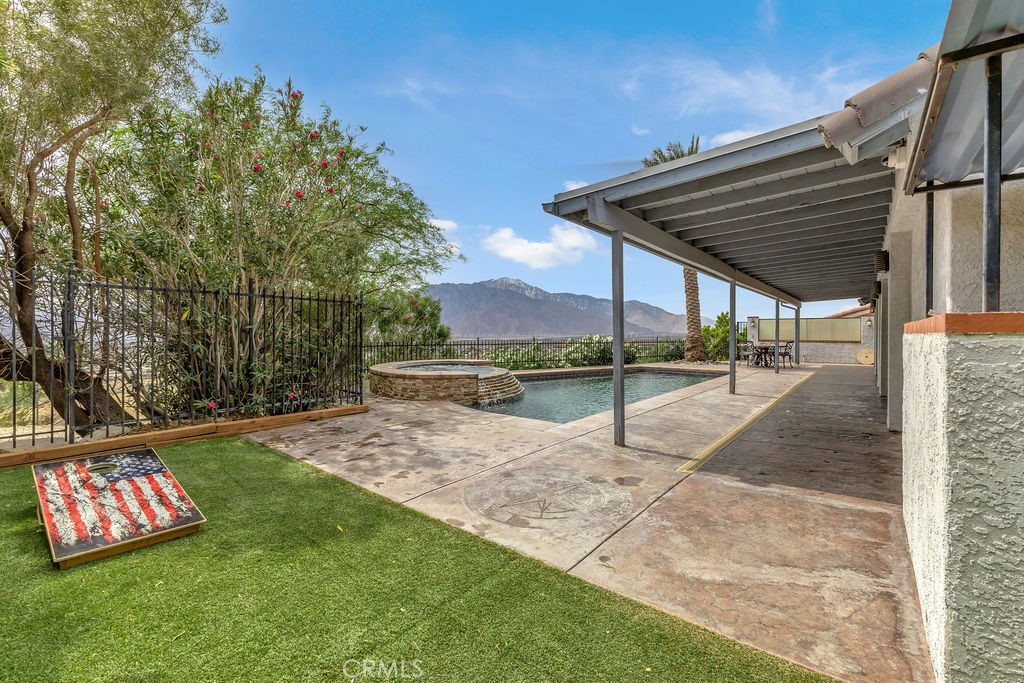 67525 Monterey Road Desert Hot Springs, CA 92240 - Photo 50 of 75 a view of swimming pool with a patio