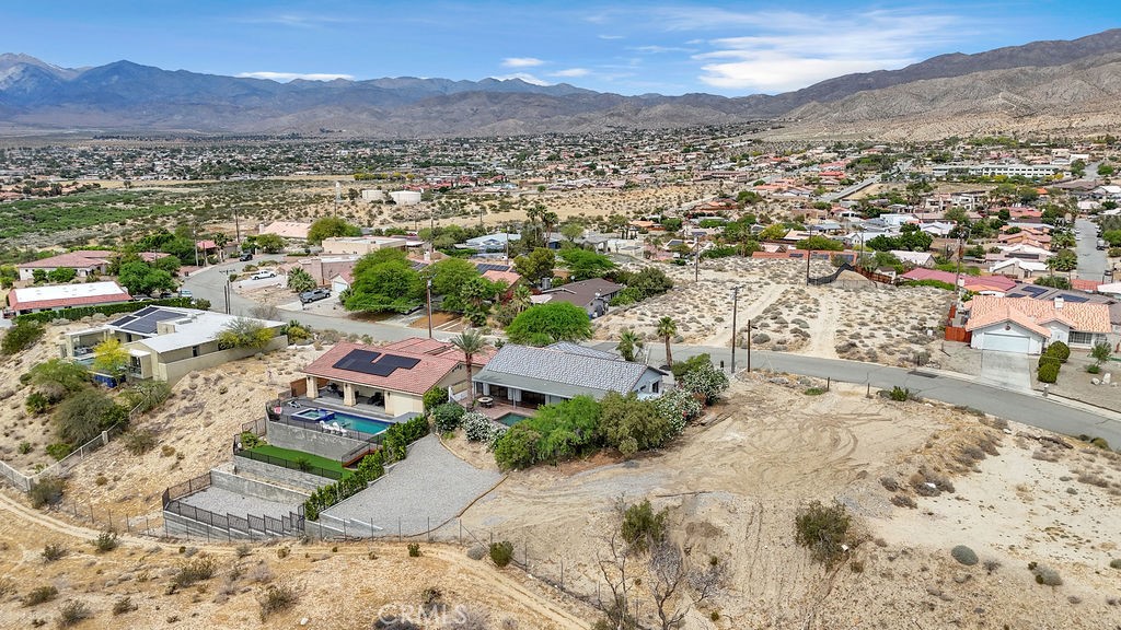 67525 Monterey Road Desert Hot Springs, CA 92240 - Photo 73 of 75 a view of a city with mountains in the background