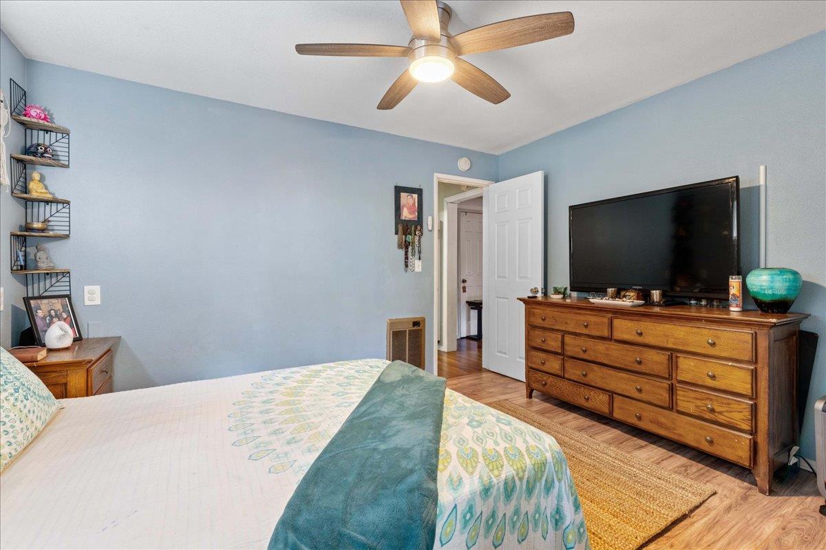 6780 Ridgeway Drive Pollock Pines, CA 95726 - Photo 12 of 27 a bedroom with a bed and a flat screen tv