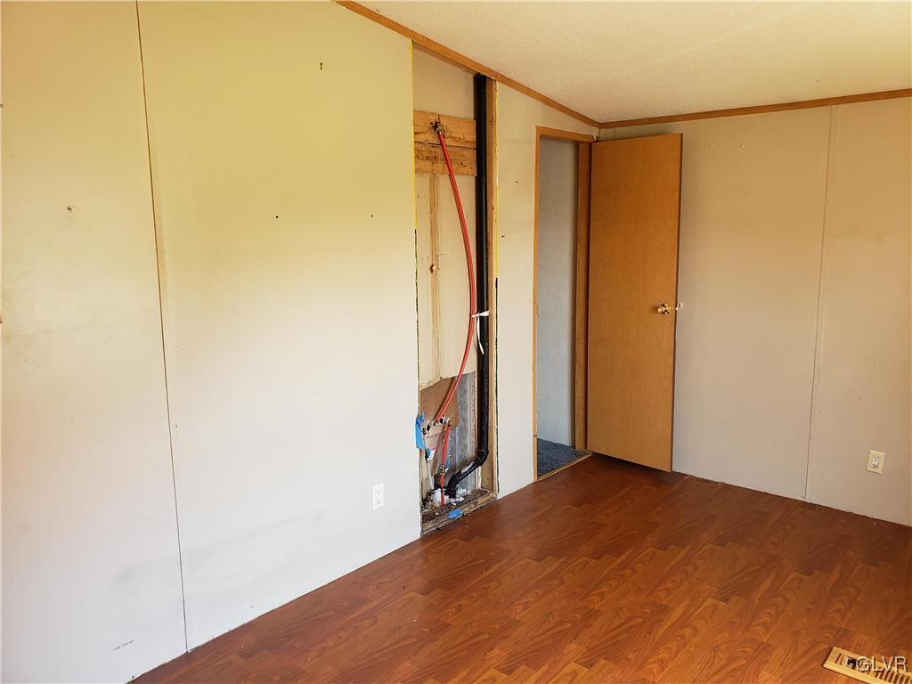 509 School Road Nazareth, PA 18064 - Photo 9 of 13 a view of empty room with wooden floor
