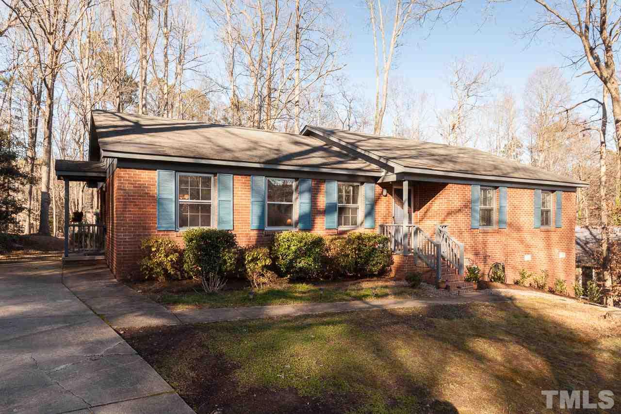 3304 Morningside Drive Raleigh, NC 27607 - Photo 1 of 24 a front view of a house with a yard