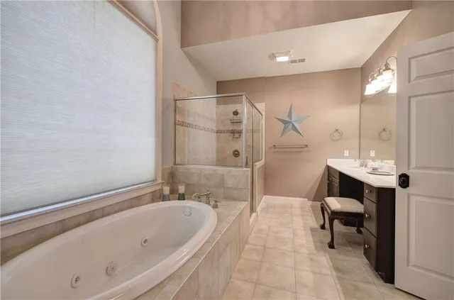 a view of a room with wooden floor and chair