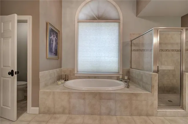 a backyard of a house with lots of trees