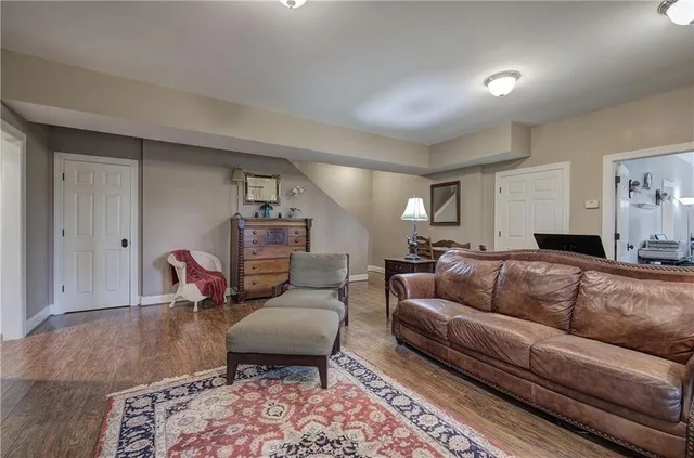 a view of house with backyard