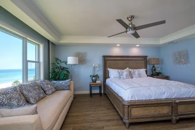 a bathroom with a double vanity sink toilet mirror and shower