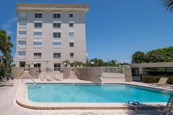 a view of a garden with a fountain