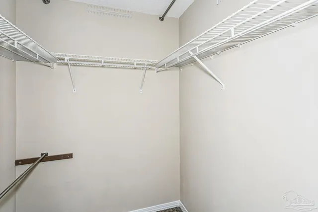a view of a room with racks on the wall