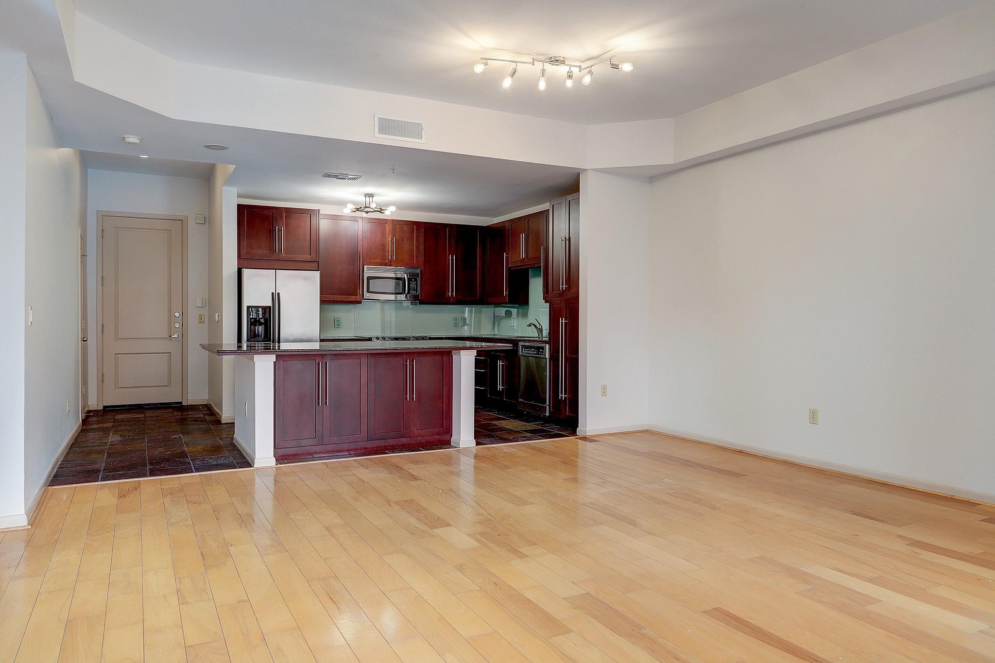 3505 Sage Road, Unit 207 Houston, TX 77056 - Photo 5 of 21 The kitchen opens up directly to the living room, making this the ideal set up for entertaining.