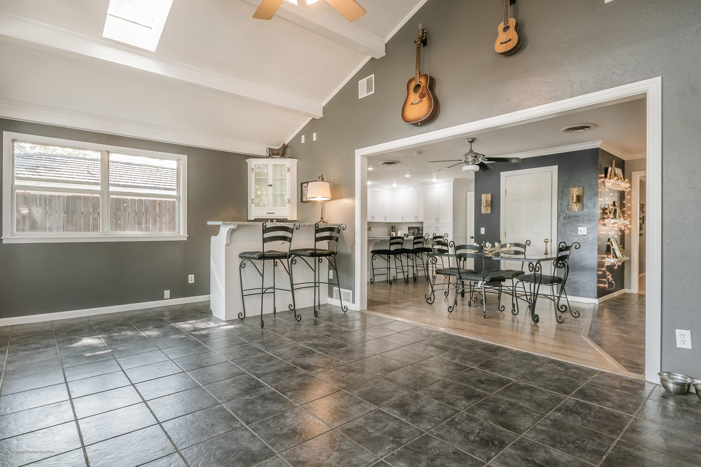 7112 Calumet Road Amarillo, TX 79106 - Photo 14 of 30 a view of a dining room kitchen with a table and chairs