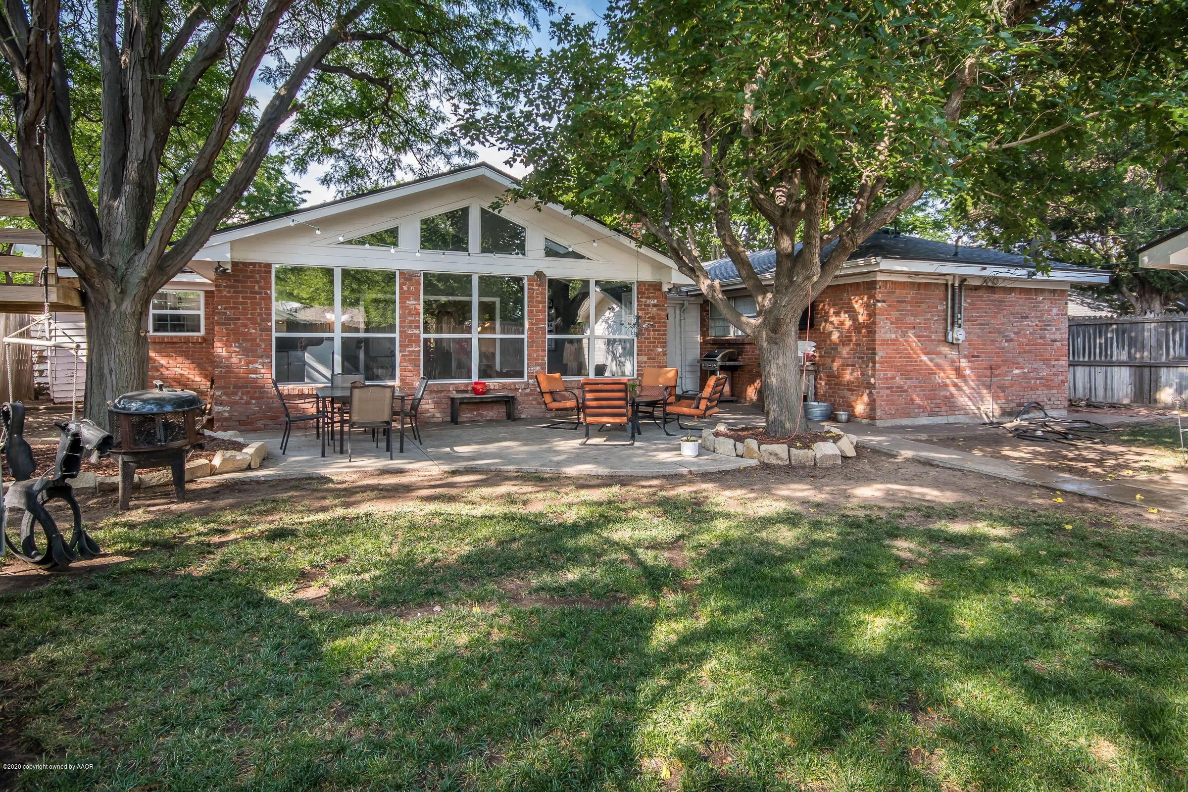 7112 Calumet Road Amarillo, TX 79106 - Photo 22 of 30 a front view of a house with garden