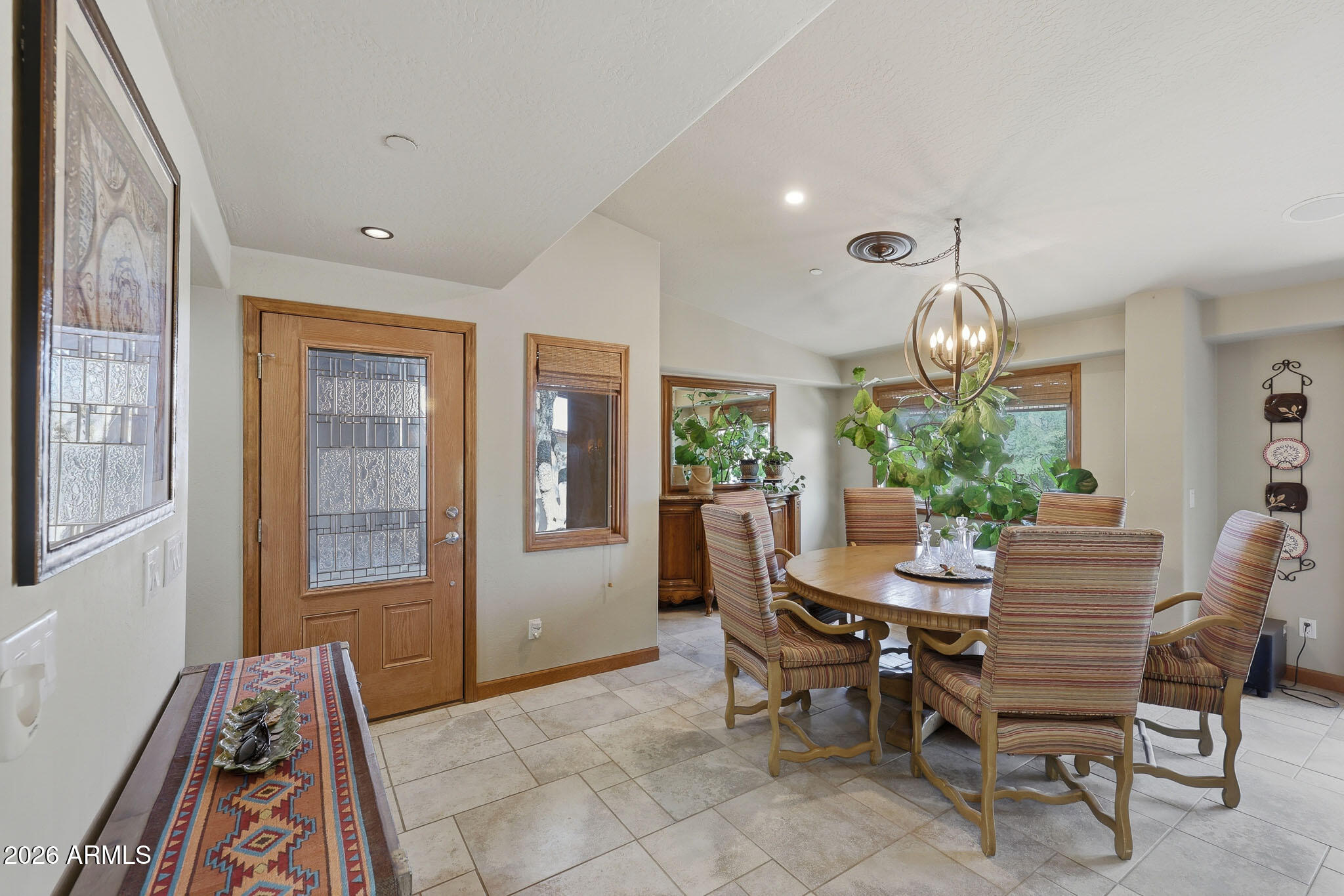 6019 East Blue Ridge Drive Cave Creek, AZ 85331 - Photo 11 of 49 a view of a dining room with furniture window and wooden floor