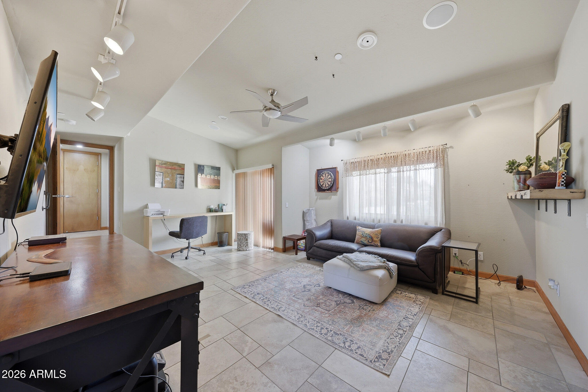 6019 East Blue Ridge Drive Cave Creek, AZ 85331 - Photo 23 of 49 a living room with furniture and wooden floor
