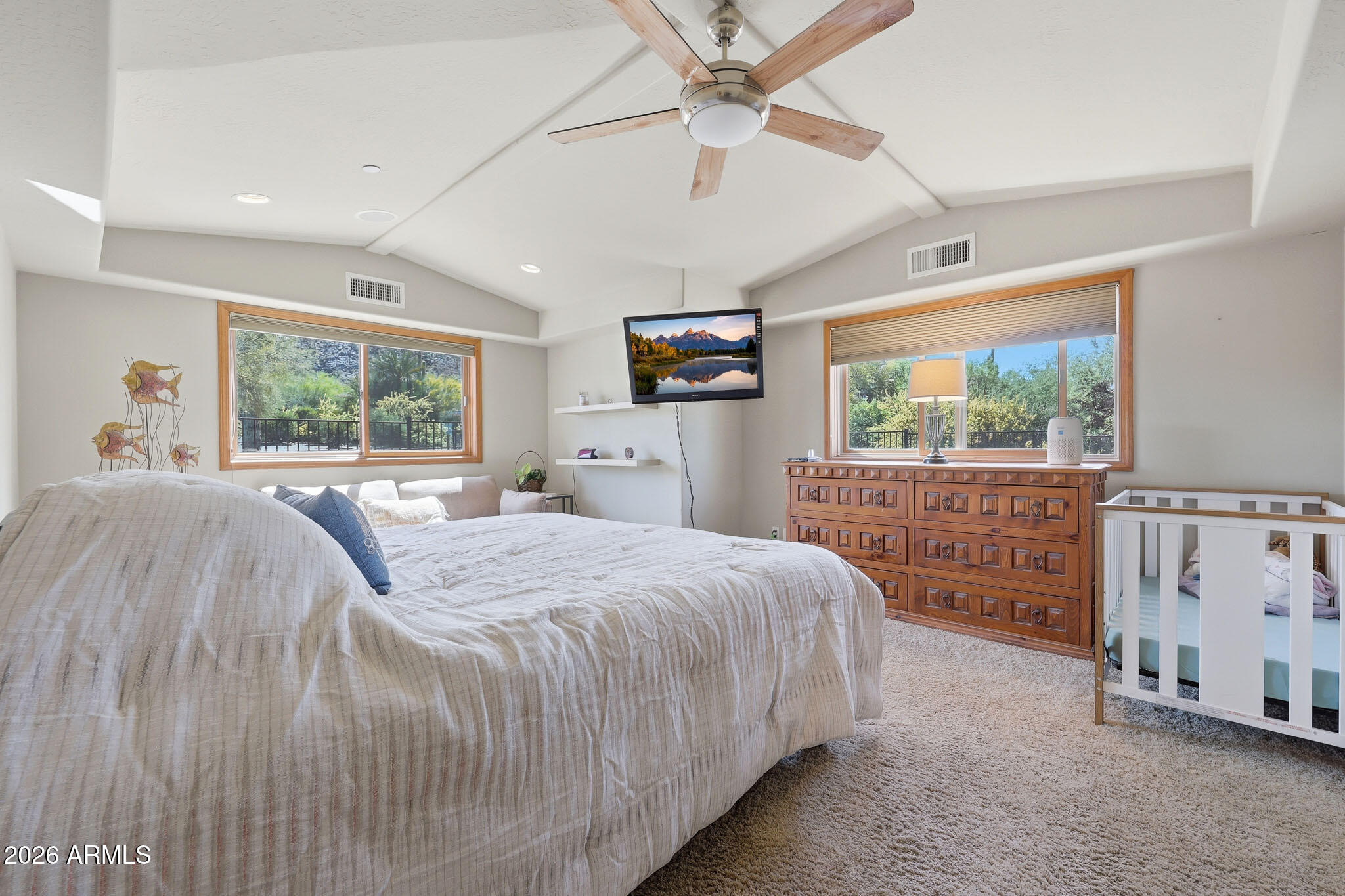 6019 East Blue Ridge Drive Cave Creek, AZ 85331 - Photo 37 of 49 a bed room with a bed and a large window