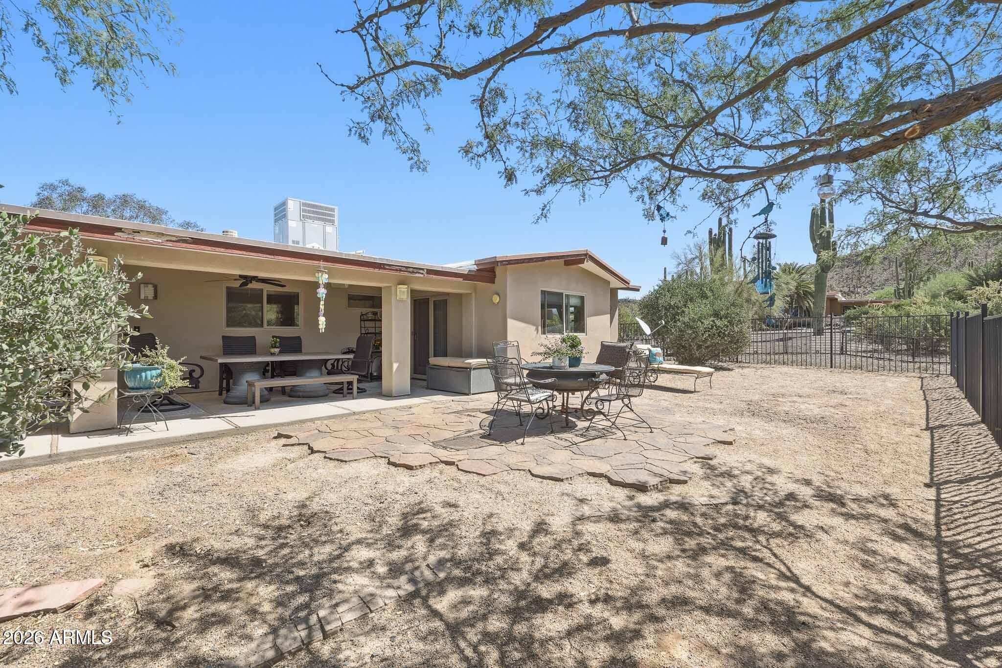 6019 East Blue Ridge Drive Cave Creek, AZ 85331 - Photo 40 of 49 a view of a house with a patio