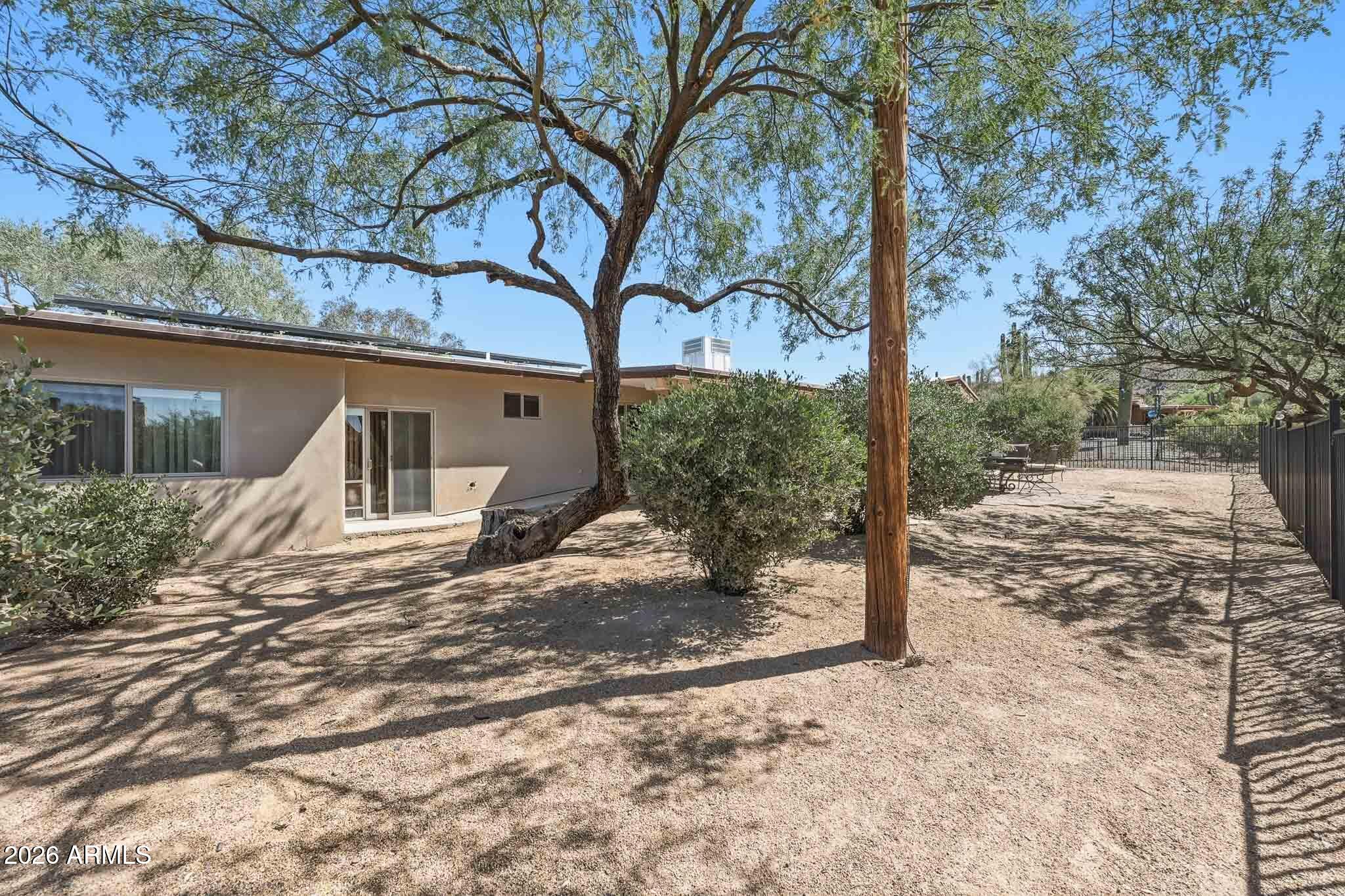 6019 East Blue Ridge Drive Cave Creek, AZ 85331 - Photo 41 of 49 a view of a house with a yard covered in snow