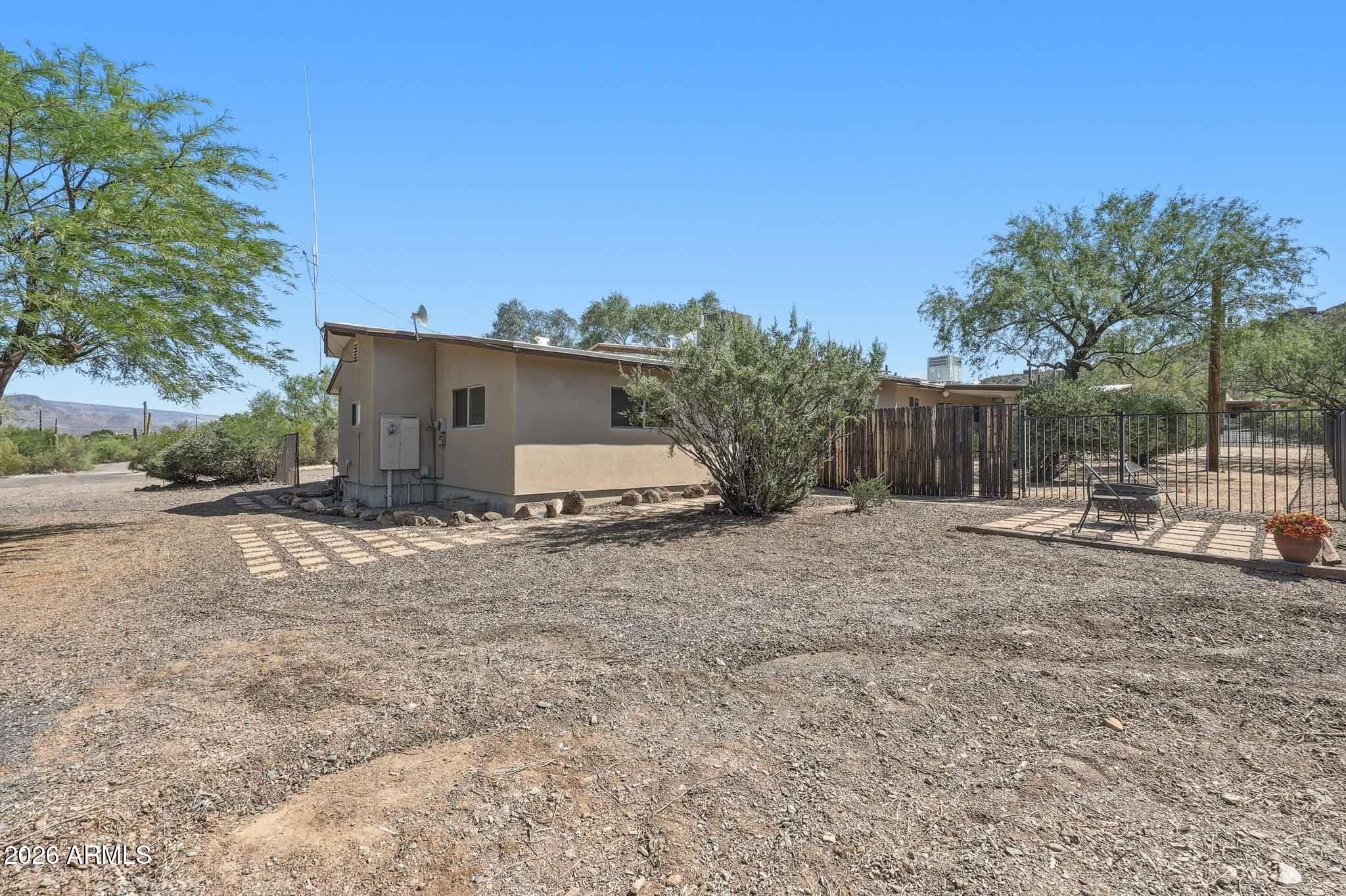 6019 East Blue Ridge Drive Cave Creek, AZ 85331 - Photo 42 of 49 a view of a backyard with a tree