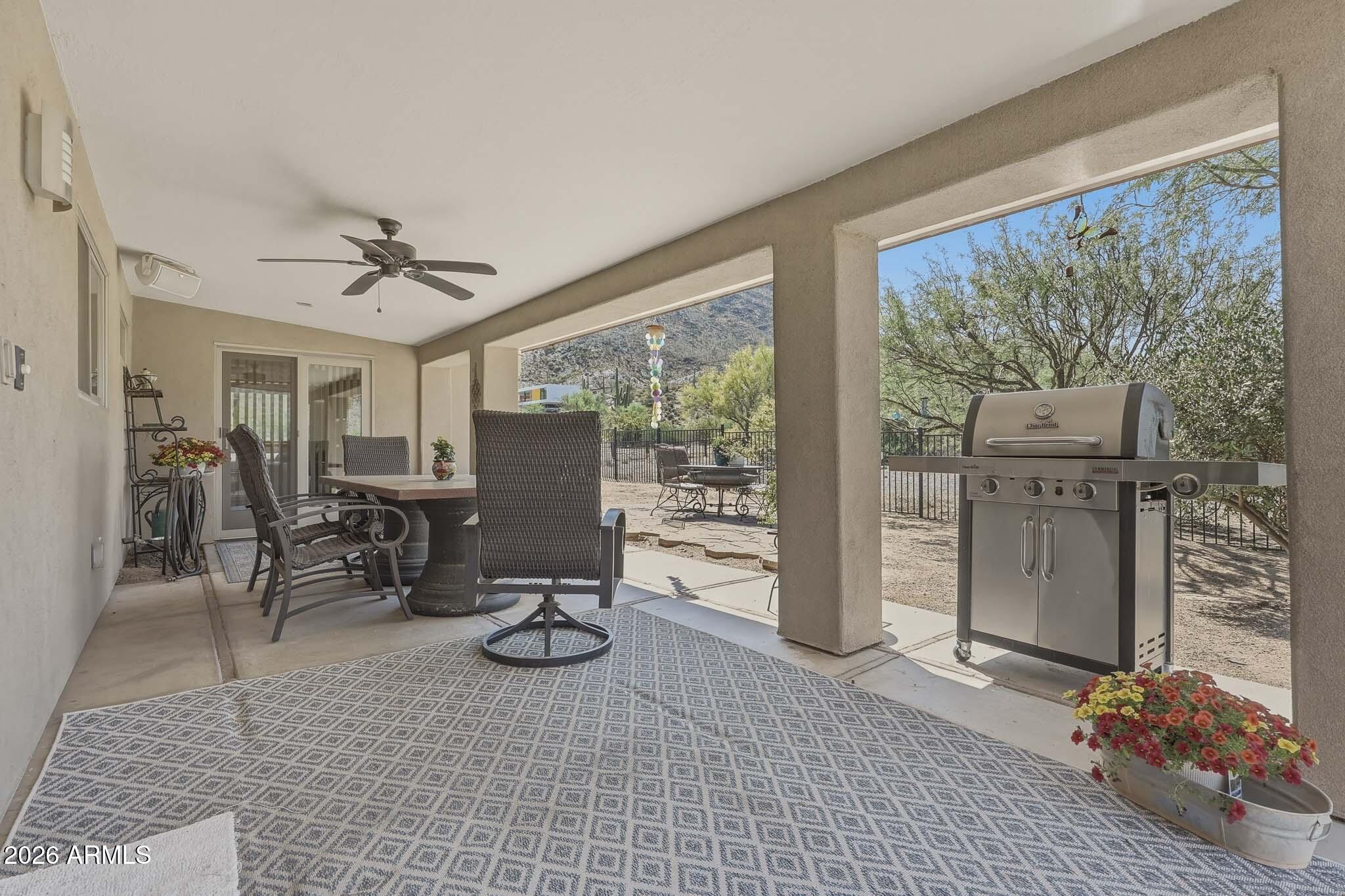 6019 East Blue Ridge Drive Cave Creek, AZ 85331 - Photo 47 of 49 a view of a livingroom with workspace and a window