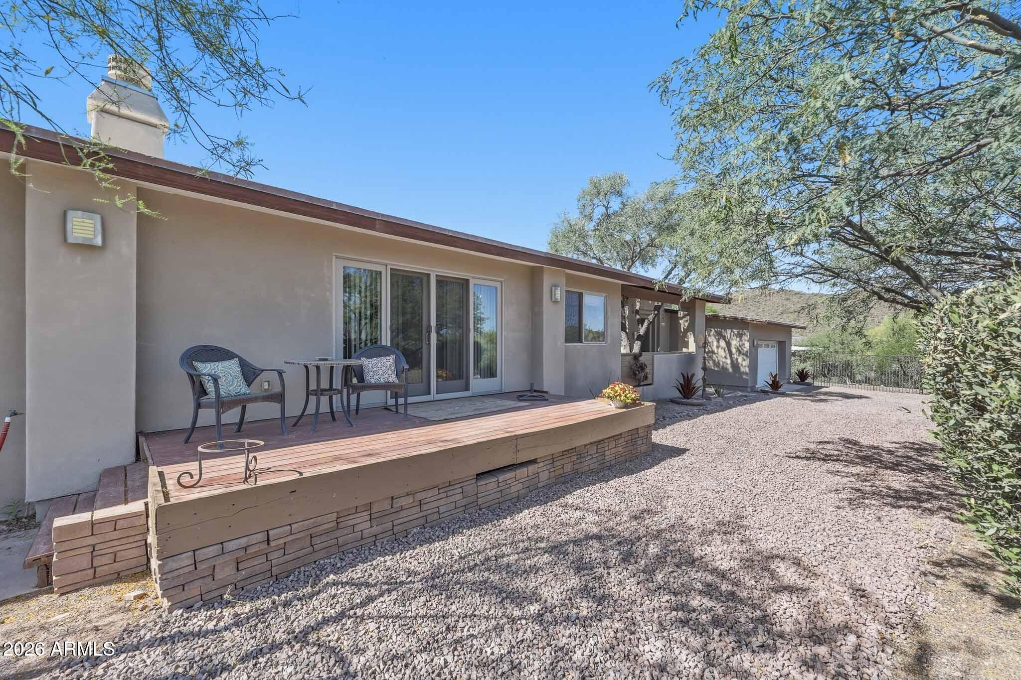 6019 East Blue Ridge Drive Cave Creek, AZ 85331 - Photo 5 of 49 a house view with a sitting space and garden