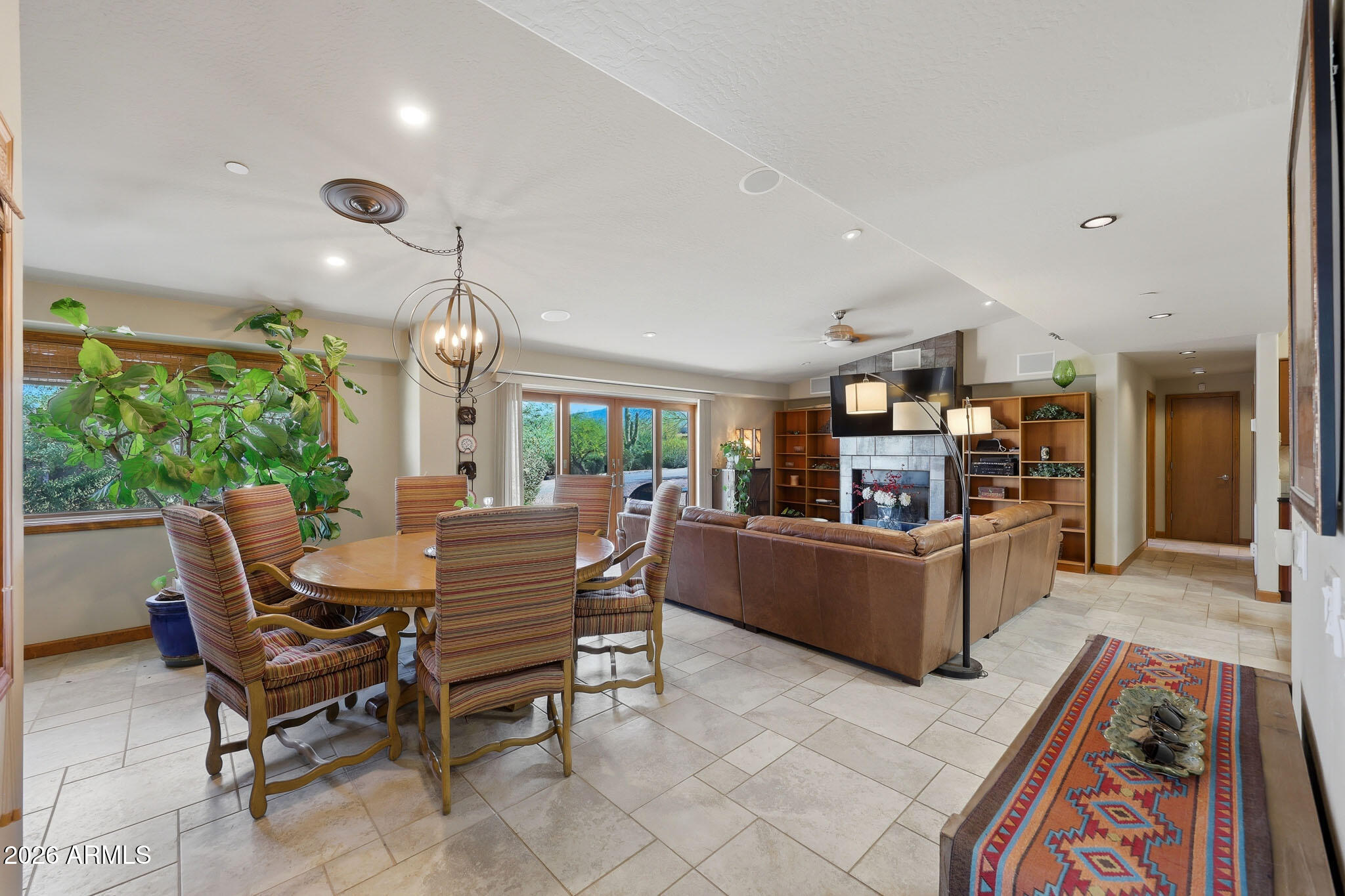 6019 East Blue Ridge Drive Cave Creek, AZ 85331 - Photo 9 of 49 a dining room with furniture and a large window