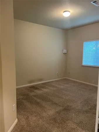 an empty room with a workbench