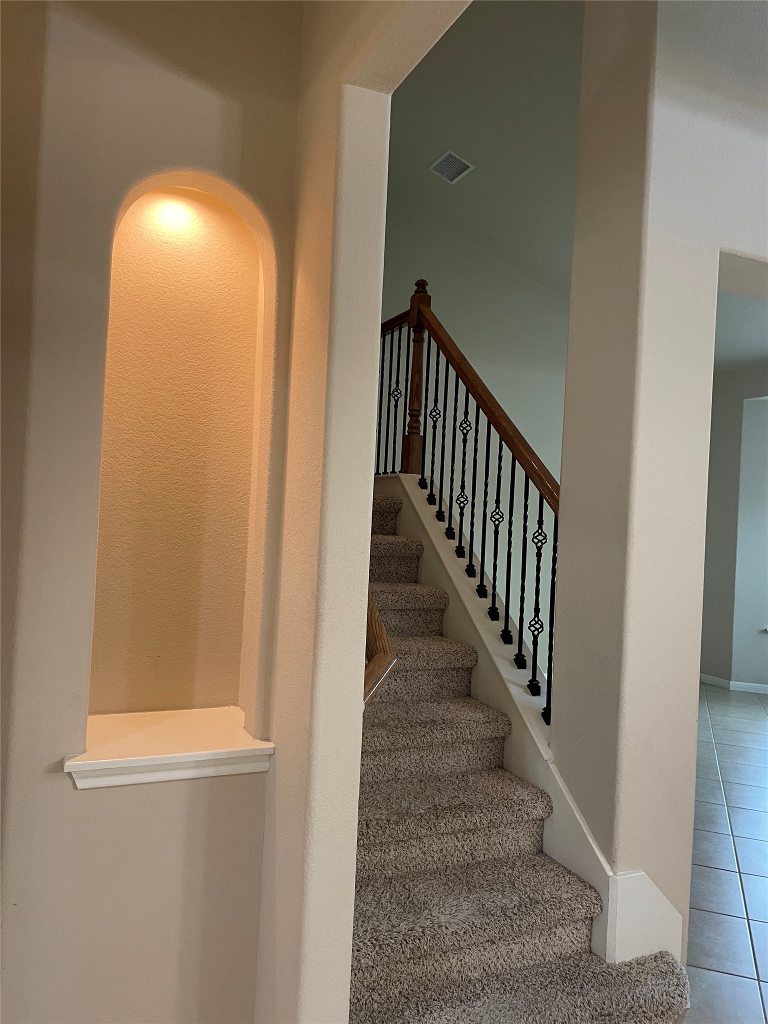 102 Sandy Lyle Cove Round Rock, TX 78664 - Photo 17 of 38 a view of staircase with wooden floor and a window