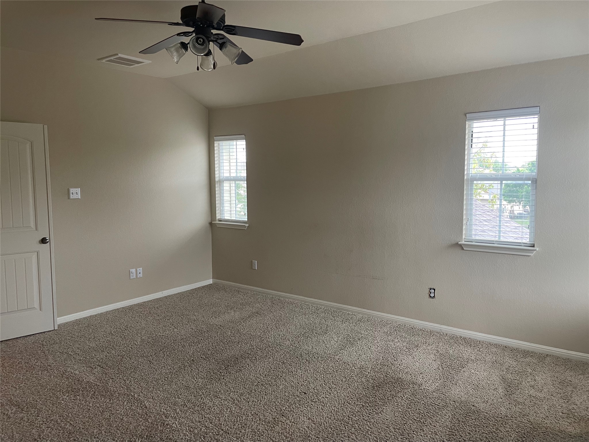102 Sandy Lyle Cove Round Rock, TX 78664 - Photo 21 of 38 a view of an empty room with a window