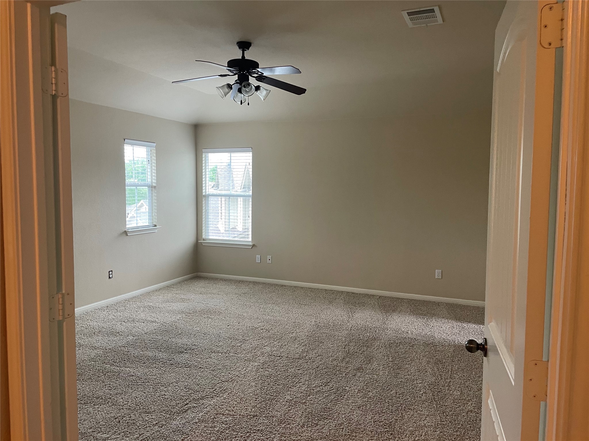 102 Sandy Lyle Cove Round Rock, TX 78664 - Photo 22 of 38 a view of an empty room with a window