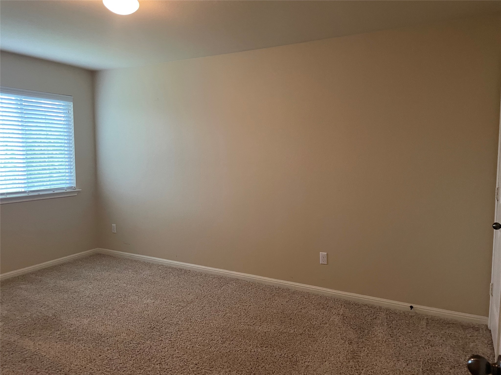 102 Sandy Lyle Cove Round Rock, TX 78664 - Photo 32 of 38 an empty room with a window