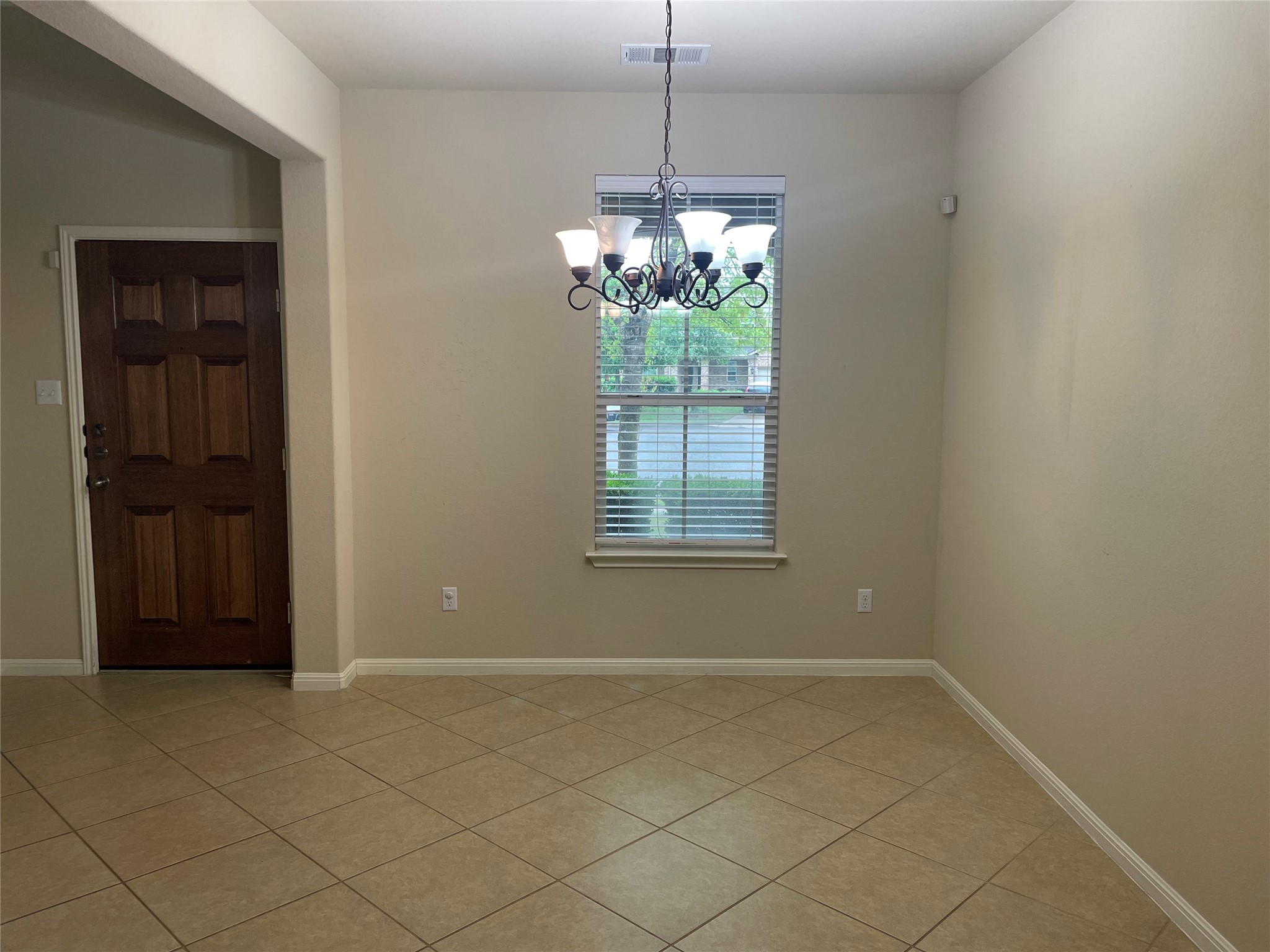 102 Sandy Lyle Cove Round Rock, TX 78664 - Photo 6 of 38 a view of a room with window