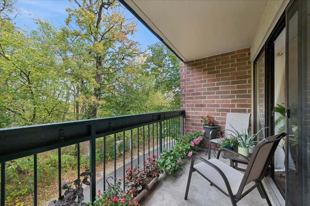 1800 Huntington Boulevard, Unit 212 Hoffman Estates, IL 60169 - Photo 12 of 15 a view of balcony with furniture