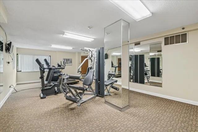 a view of a room with gym equipment