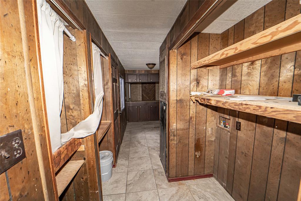 122 County Road 306 Breckenridge, TX 76424 - Photo 27 of 40 a view of an entryway with furniture and a window