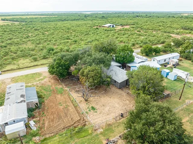 a house with trees in the background